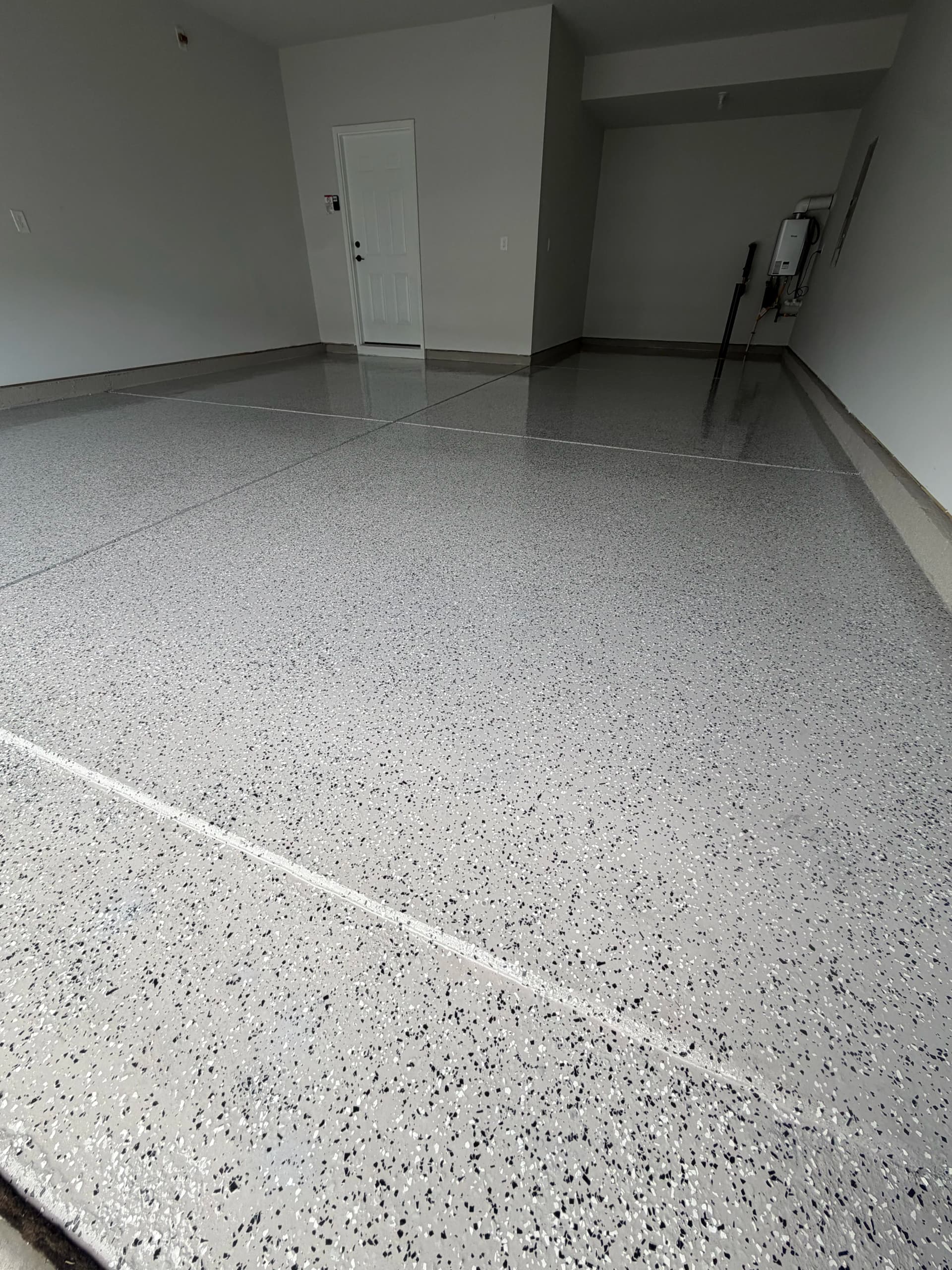 Gallery photos for Garage Floor Gets a Clean Upgrade With Epoxy Flake Finish: Image #1